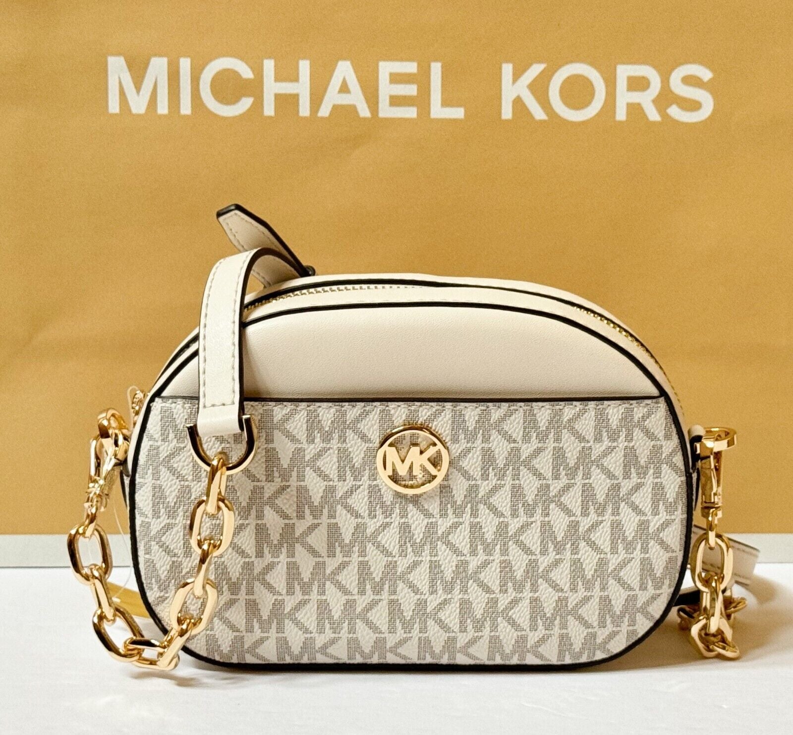 MICHAEL KORS JET SET GLAM SMALL FRONT POCKET OVAL CROSSBODY BAG MK LIGHT CREAM