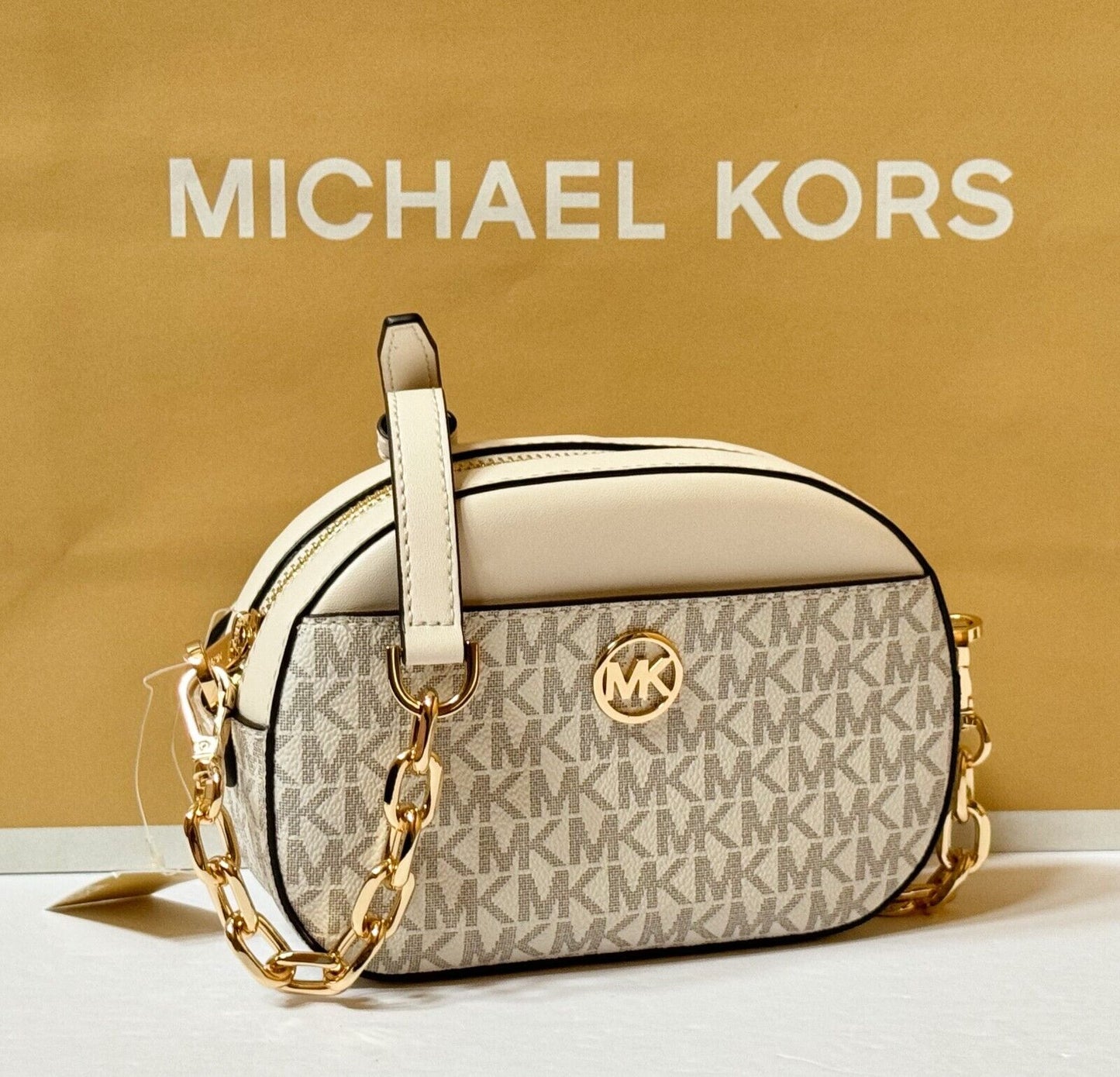 MICHAEL KORS JET SET GLAM SMALL FRONT POCKET OVAL CROSSBODY BAG MK LIGHT CREAM